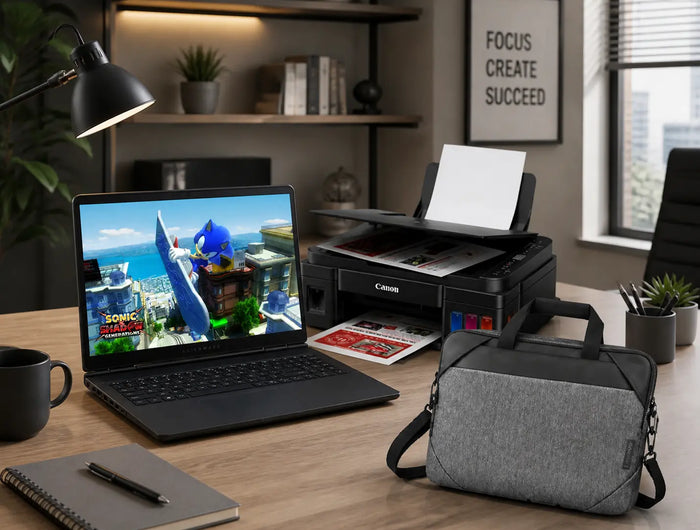 Grey laptop shoulder bag on home office desk with laptop and printer for everyday work use.